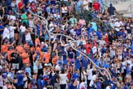 Chicago Cubs fans in the bleachers of Wrigley Field.